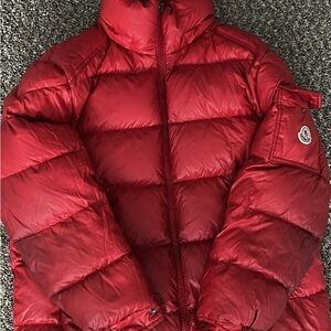 Moncler Red Quilted Jacket with Comic Care Patch